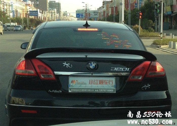 路遇宝马320i新车!~~不懂..求解!~~